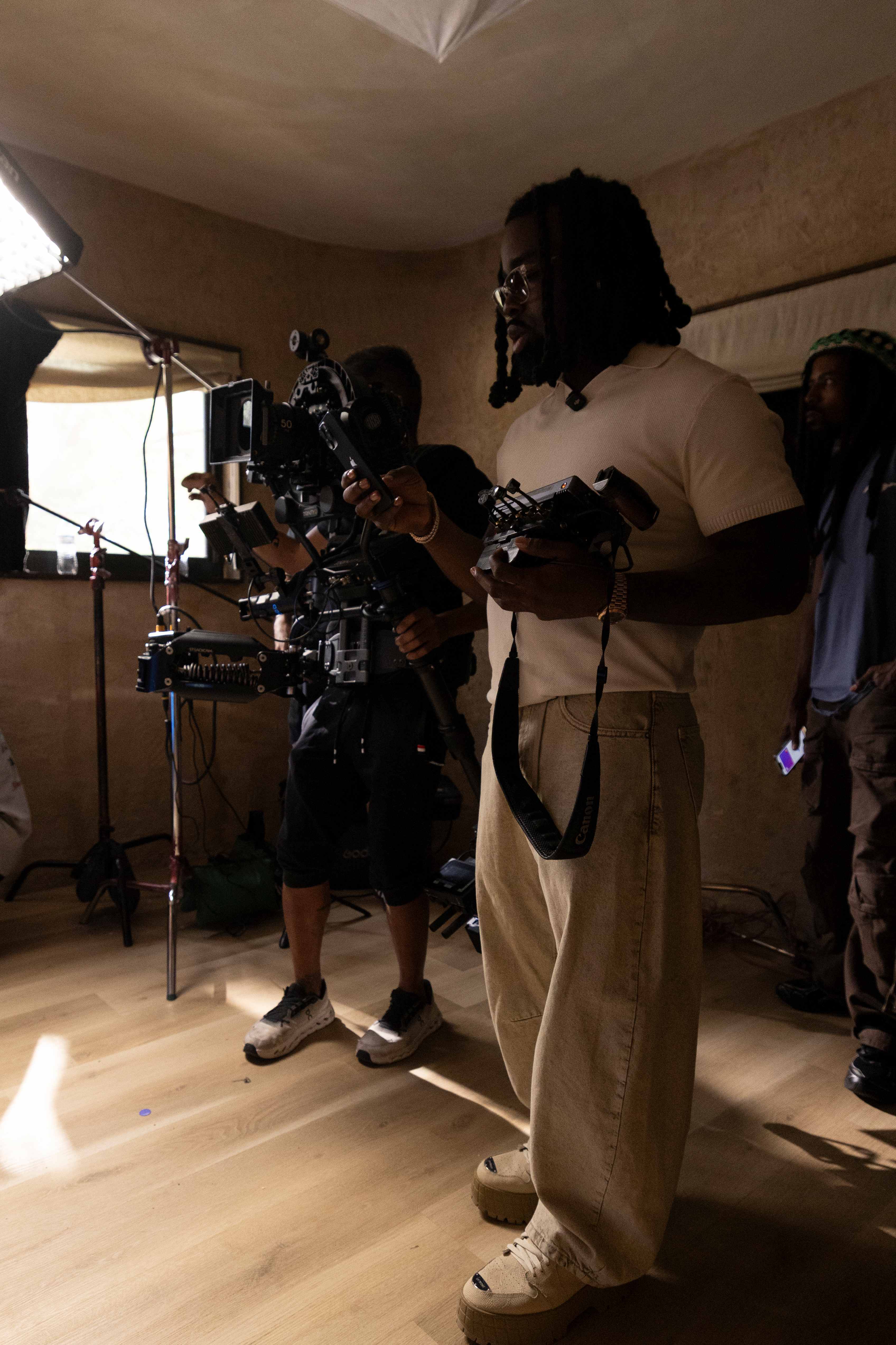 Director of photography operating a cinema rig on set